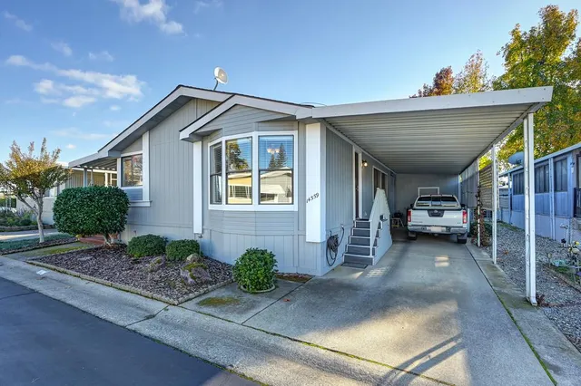 a view of a house with a patio