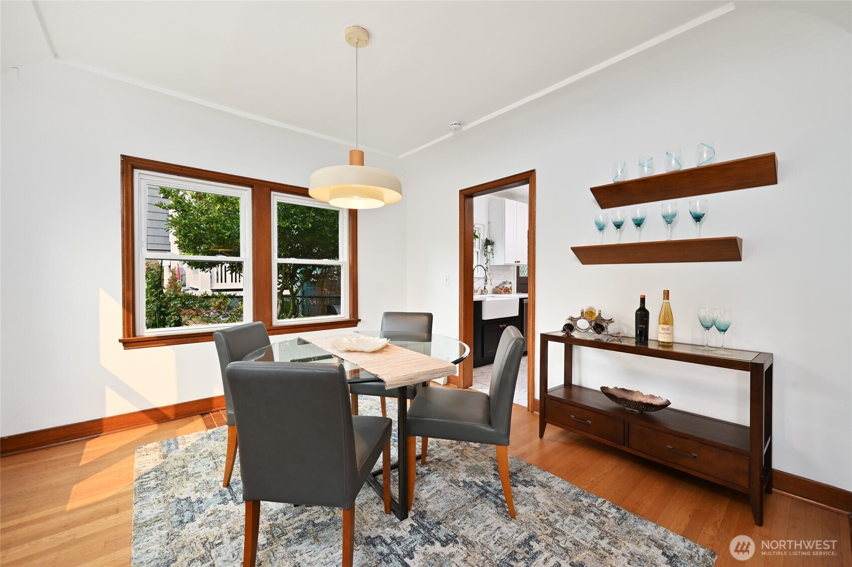 334 Northeast 57th Street Seattle, WA 98105 - Photo 11 of 39 a dining room with furniture and window