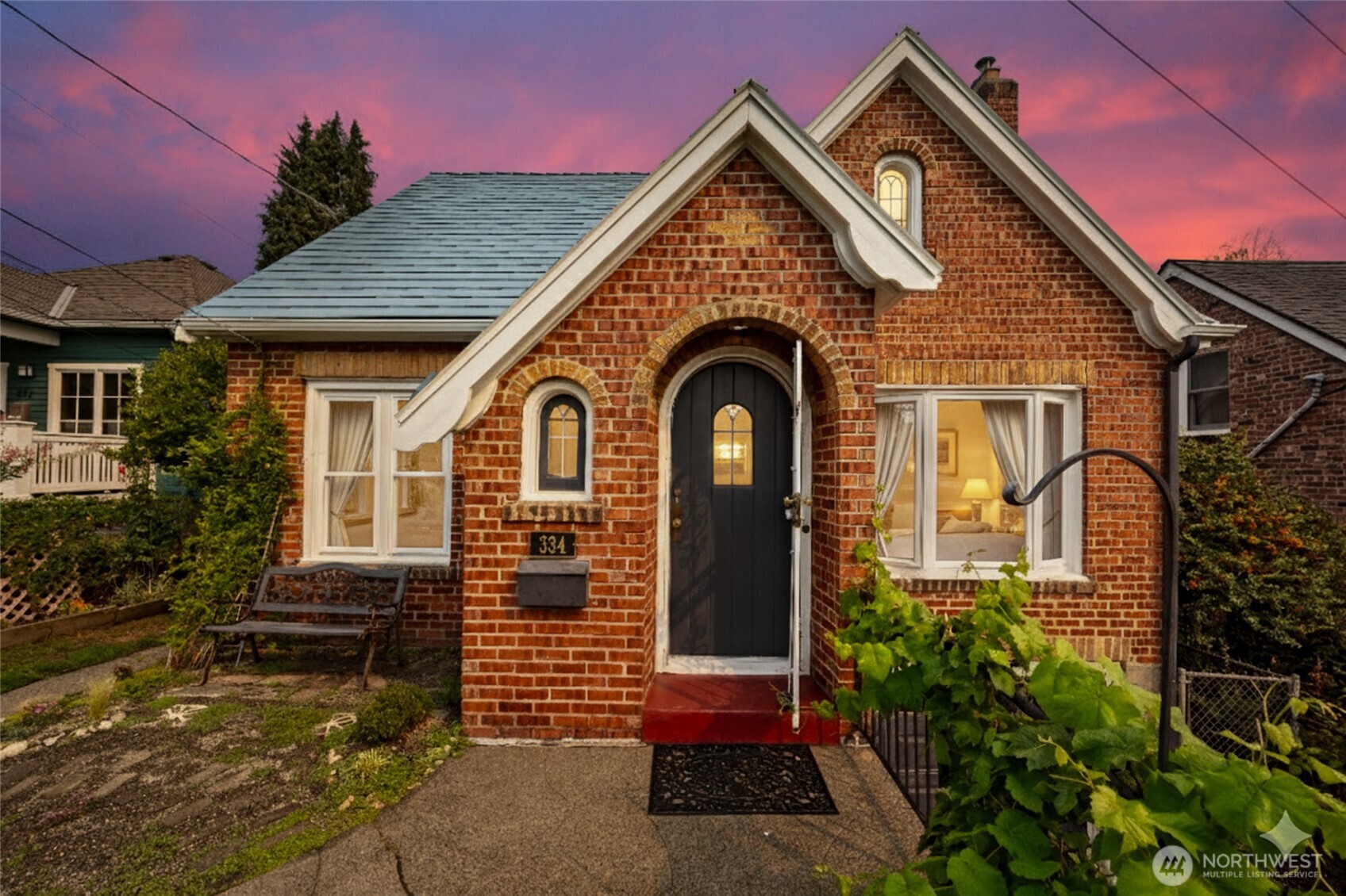 334 Northeast 57th Street Seattle, WA 98105 - Photo 2 of 39 a front view of a house with garden