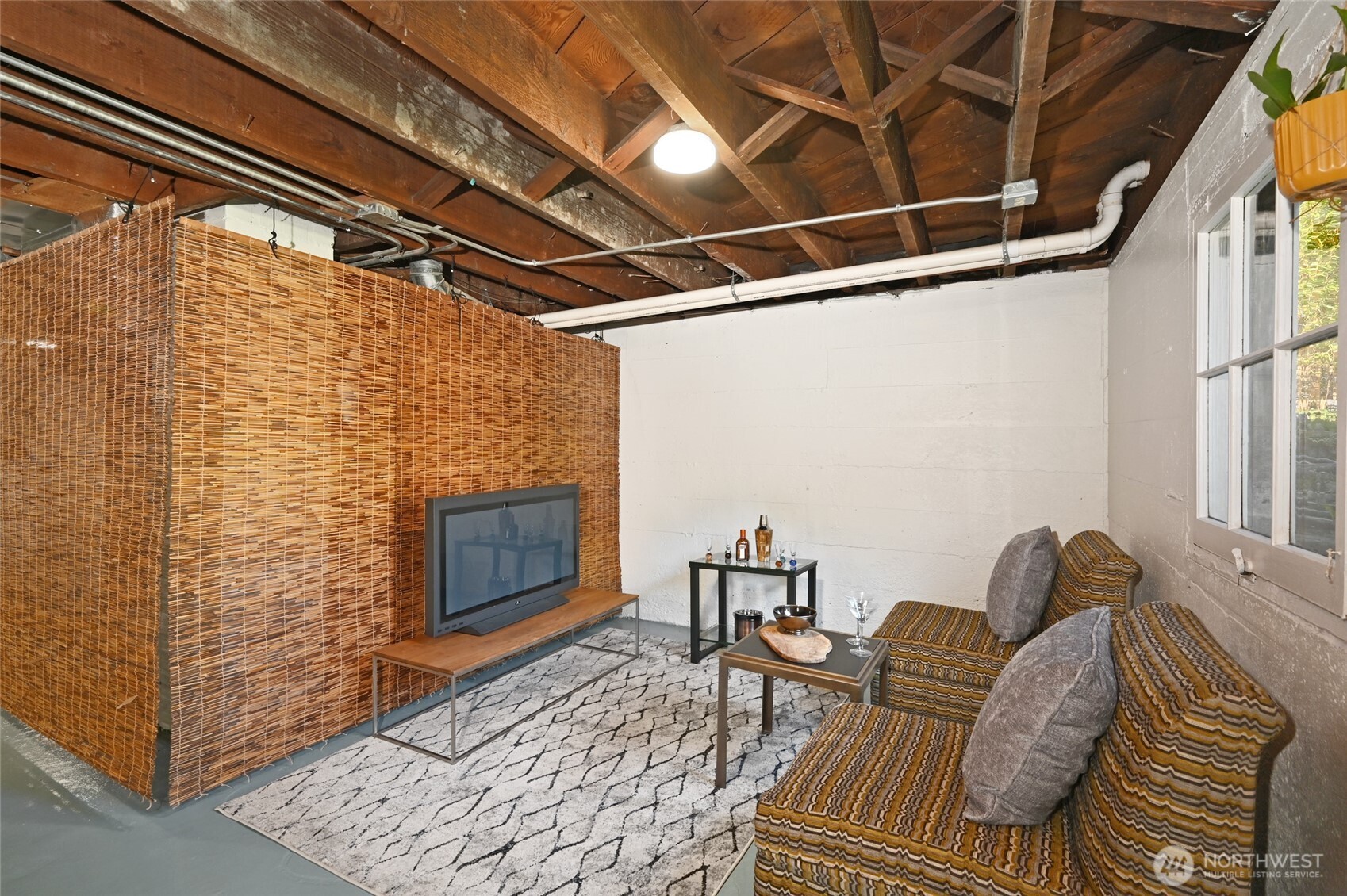 334 Northeast 57th Street Seattle, WA 98105 - Photo 27 of 39 a outdoor living space with furniture and a fireplace