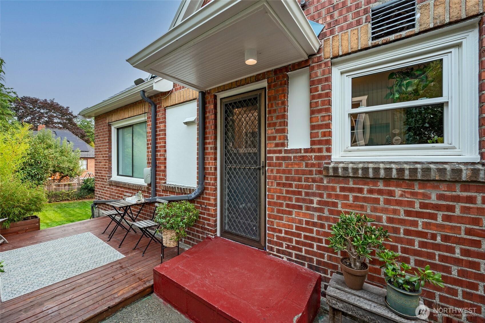334 Northeast 57th Street Seattle, WA 98105 - Photo 32 of 39 a view of a house with a yard