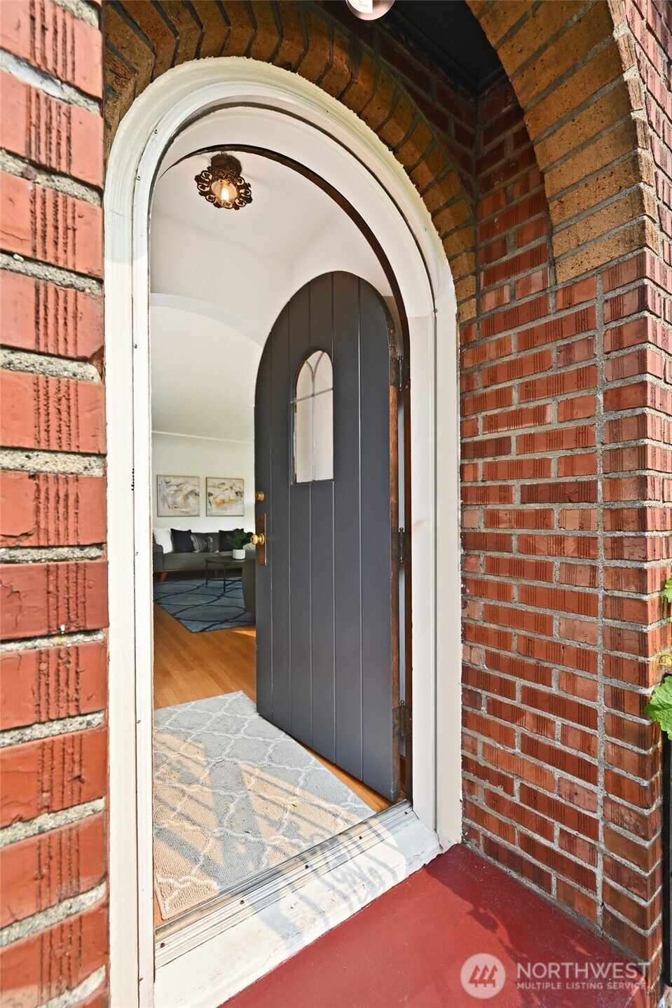334 Northeast 57th Street Seattle, WA 98105 - Photo 5 of 39 a view of a wooden door with a utility room