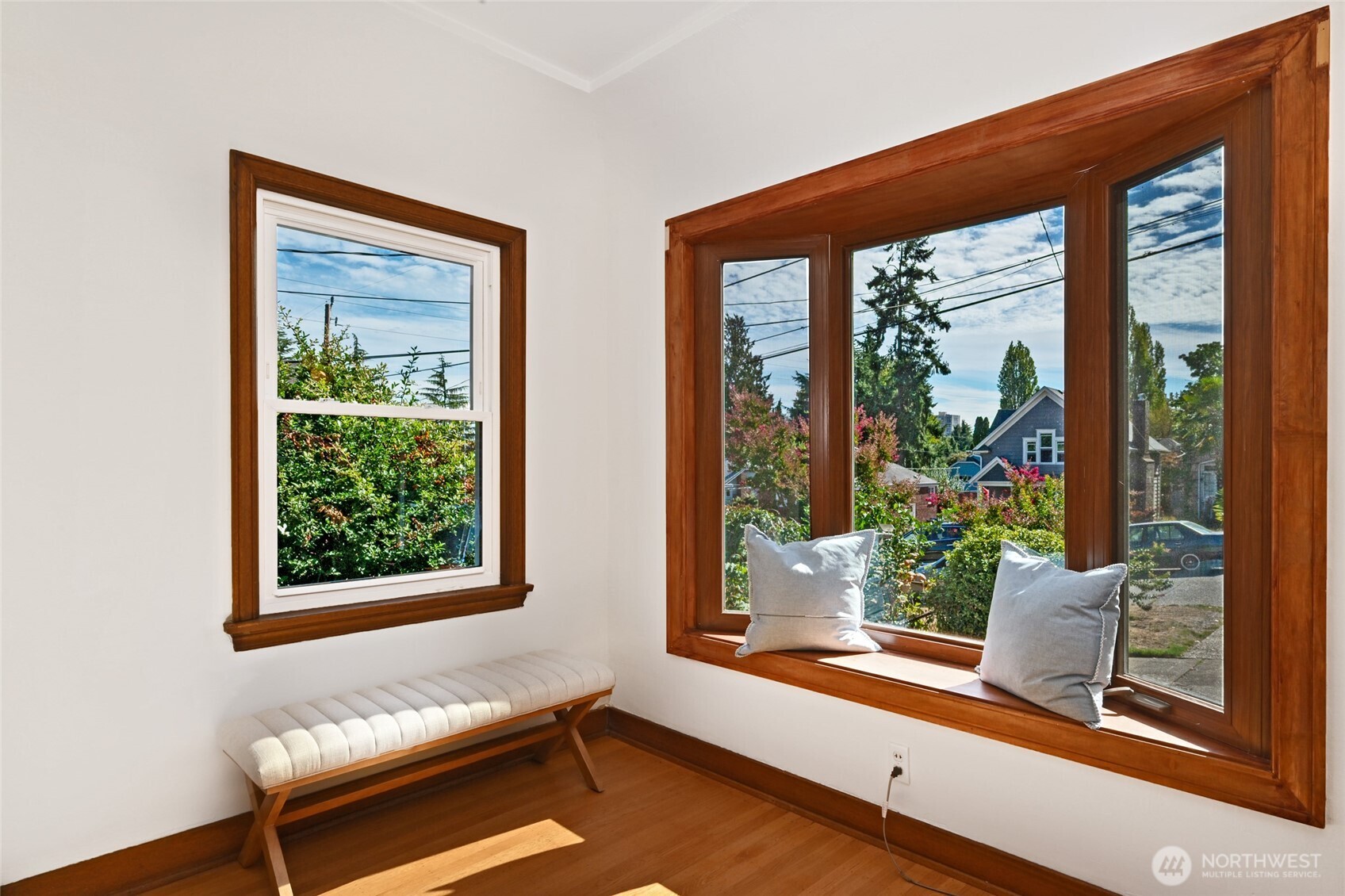 334 Northeast 57th Street Seattle, WA 98105 - Photo 7 of 39 a living room with furniture and a window