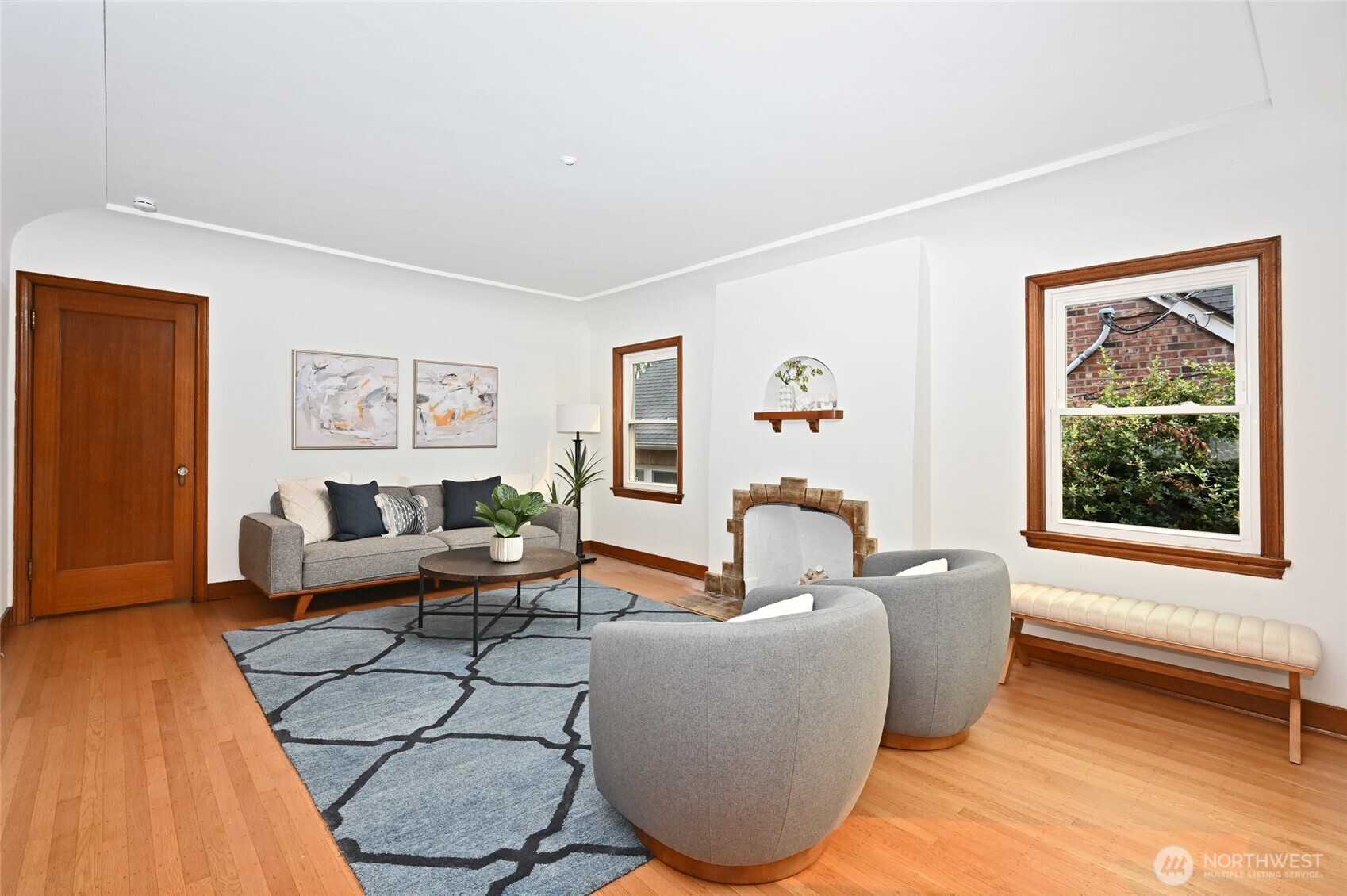 334 Northeast 57th Street Seattle, WA 98105 - Photo 9 of 39 a living room with furniture and a window