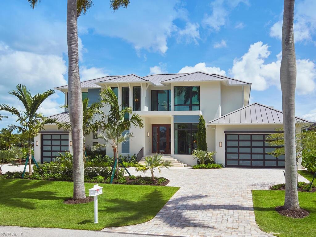 575 17th Avenue South Naples, FL 34102 - Photo 39 of 43 View of front facade with a front yard