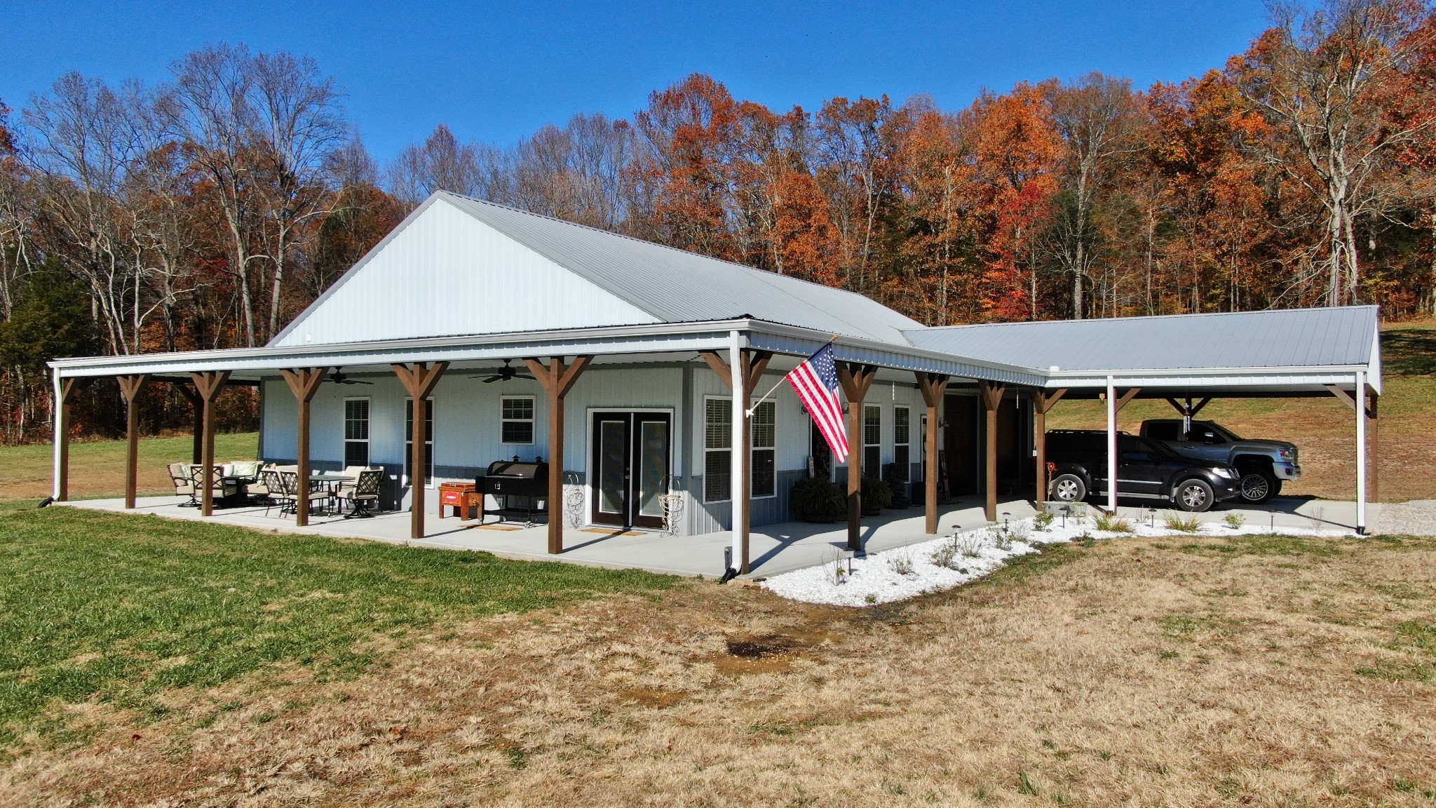 191 Doug Williams Road Portland, TN 37148 - Photo 1 of 51 a view of a house with a yard patio and wooden fence