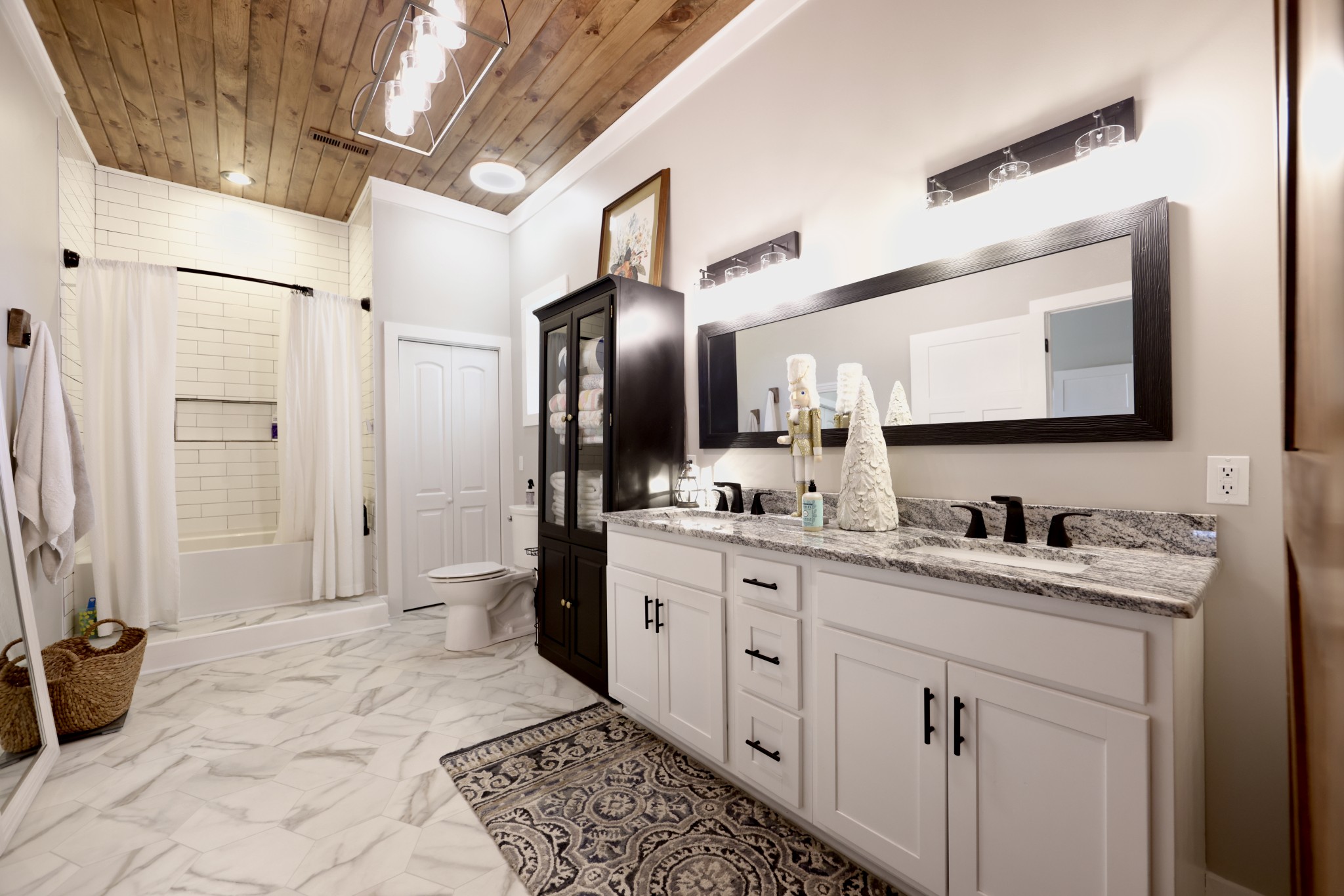 191 Doug Williams Road Portland, TN 37148 - Photo 14 of 51 a spacious bathroom with a double vanity sink mirror and shower