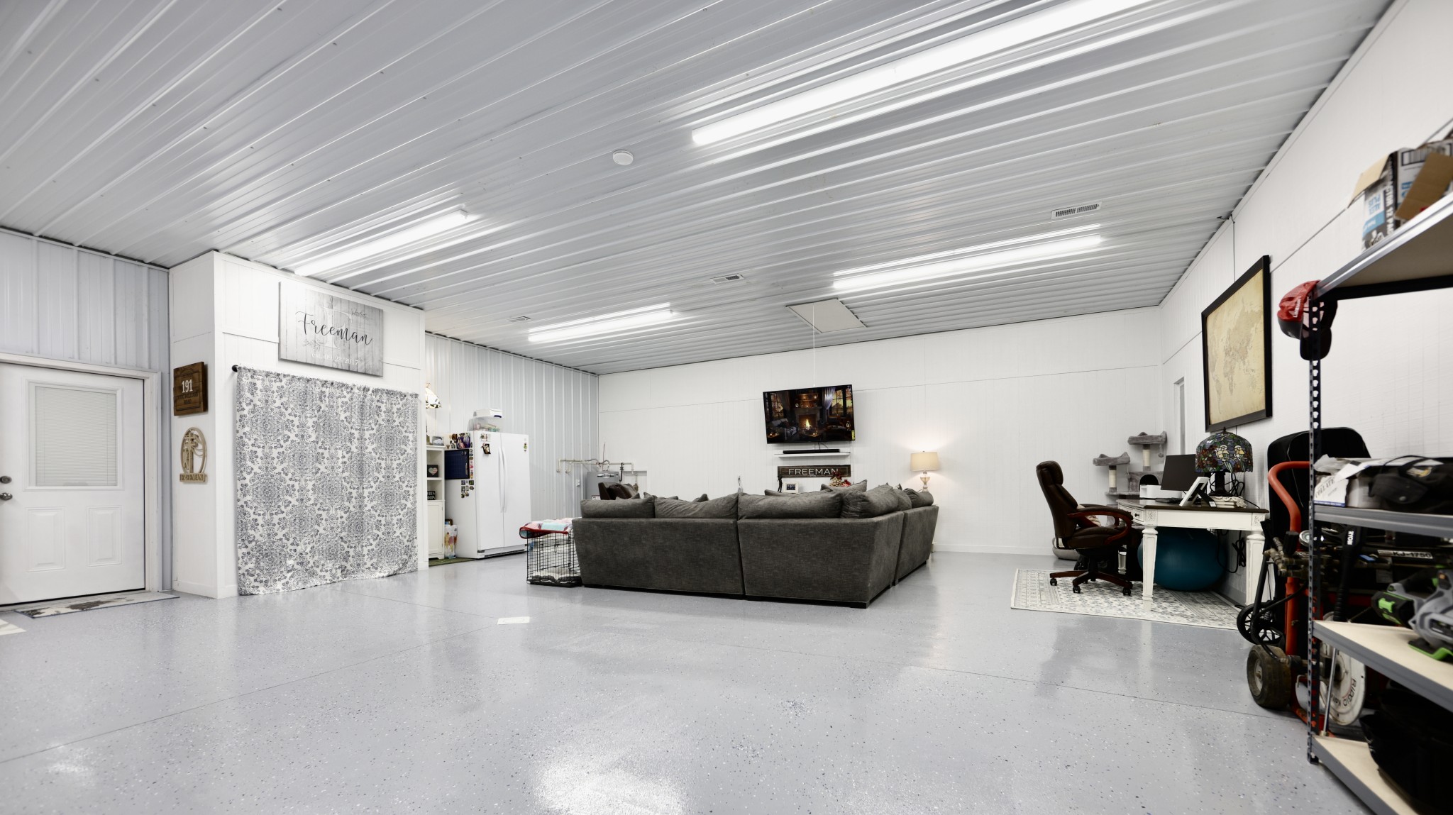 191 Doug Williams Road Portland, TN 37148 - Photo 23 of 51 a living room with furniture and a flat screen tv