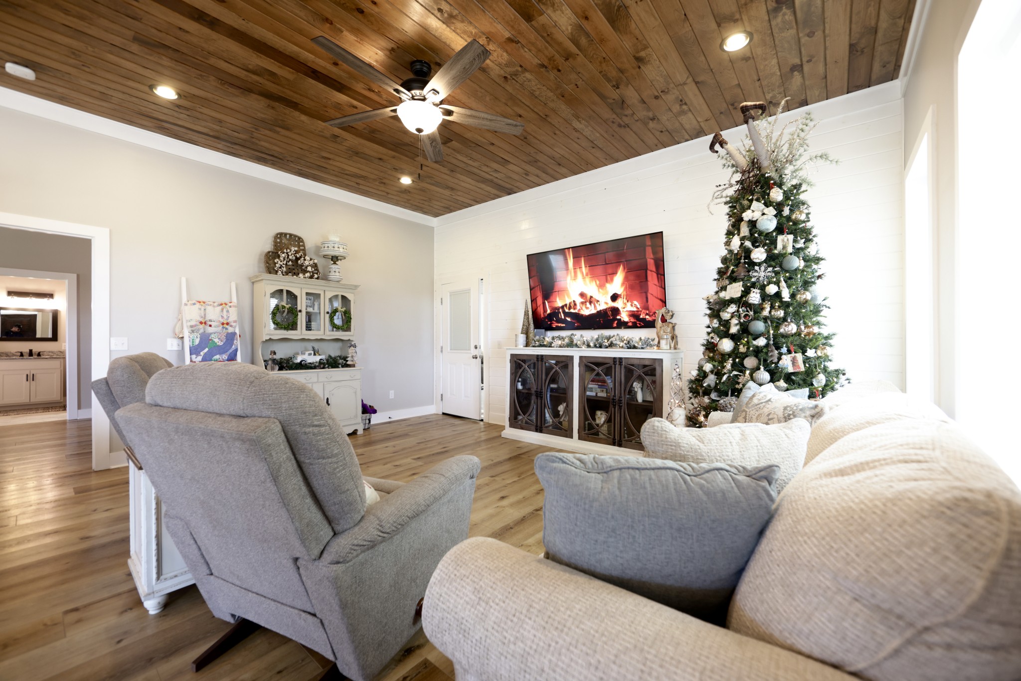191 Doug Williams Road Portland, TN 37148 - Photo 6 of 51 a living room with furniture a flat screen tv and a fireplace
