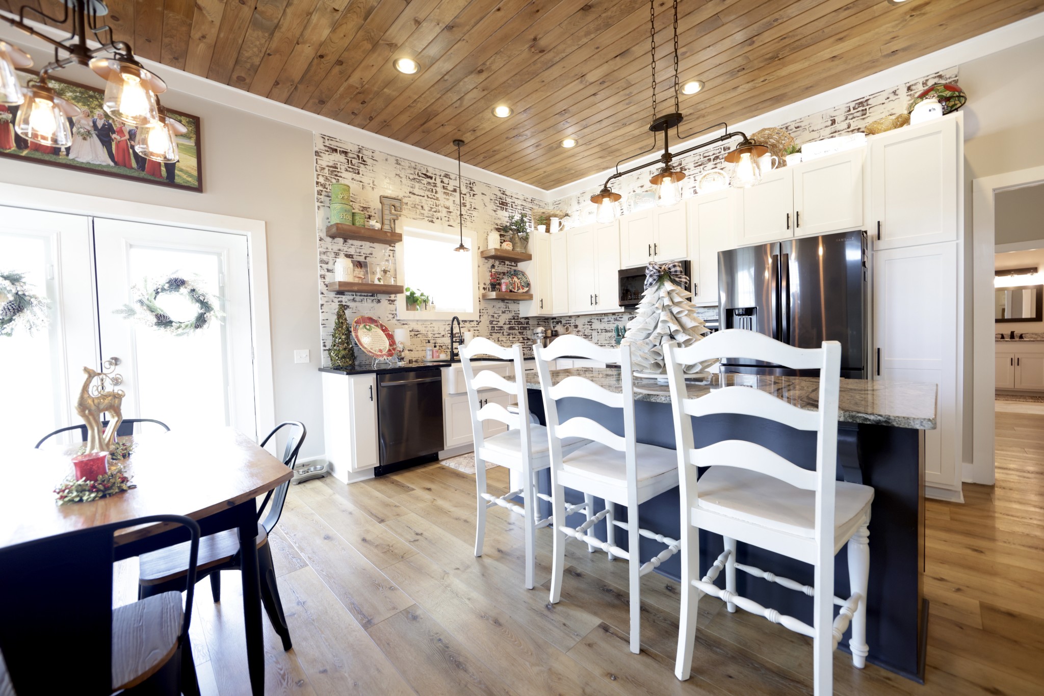 191 Doug Williams Road Portland, TN 37148 - Photo 9 of 51 a view of a dining room with furniture and wooden floor