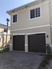 2675 Southwest 81st Terrace, Unit 2641 Miramar, FL 33025 - Photo 17 of 18 a front view of a house