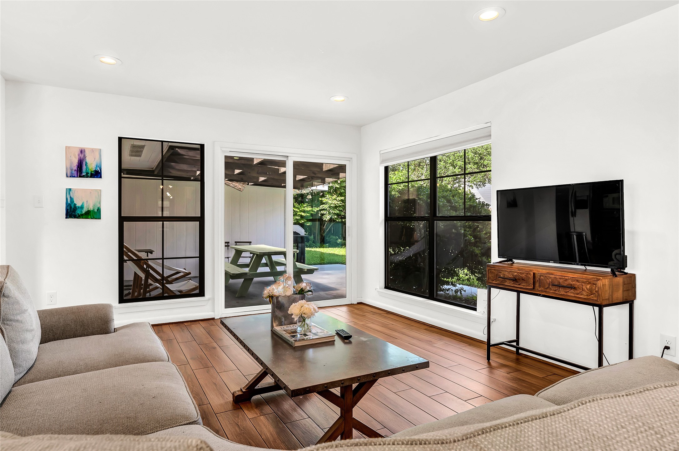 5604 Flack Street Houston, TX 77081 - Photo 7 of 22 living room by exit to patio and yard