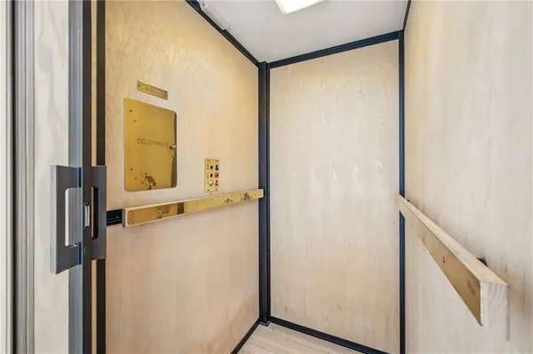 a kitchen with stainless steel appliances granite countertop a sink and a counter top space