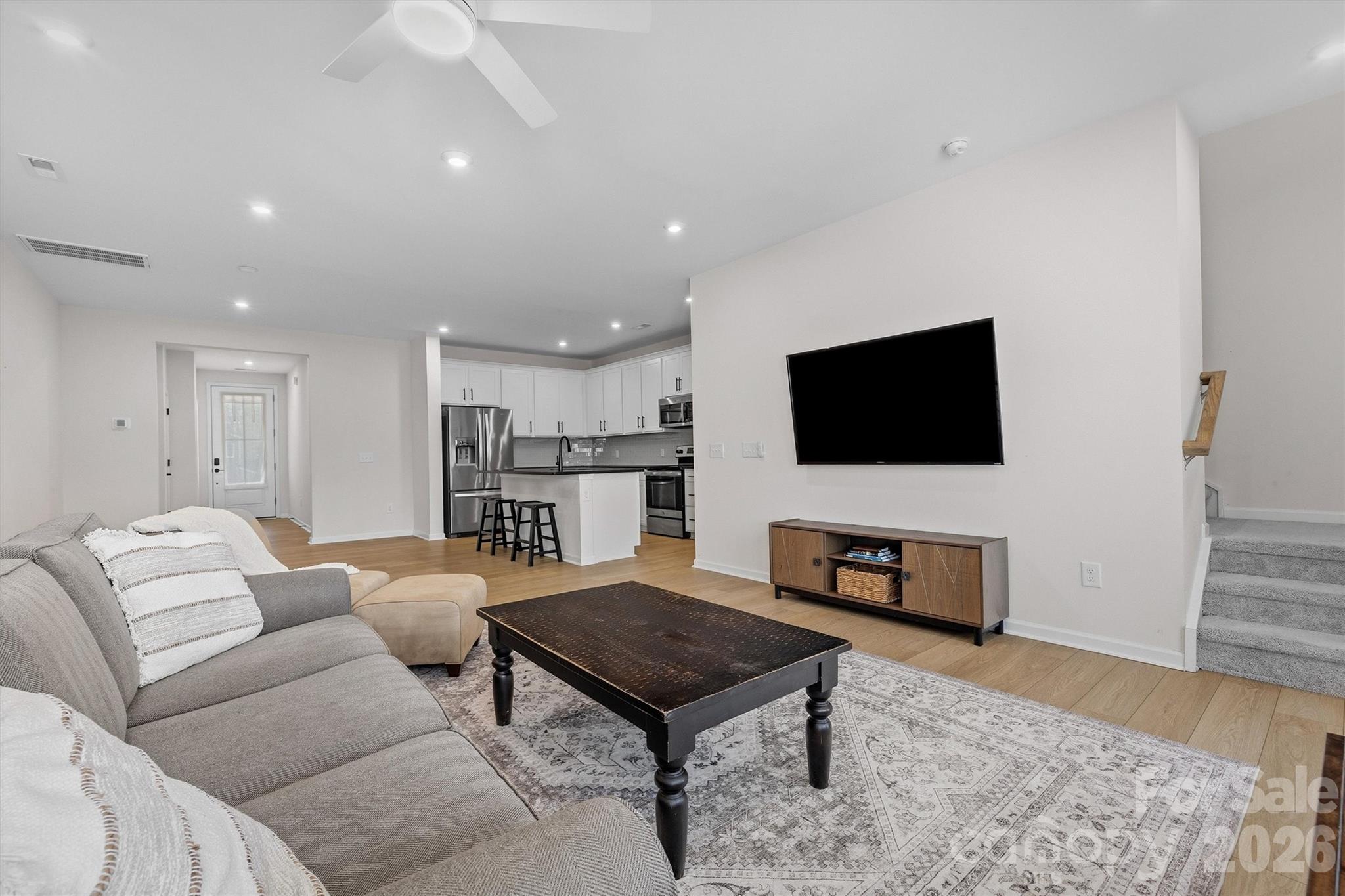 217 Brooks Springs Drive Fort Mill, SC 29708 - Photo 16 of 36 a living room with furniture and a flat screen tv