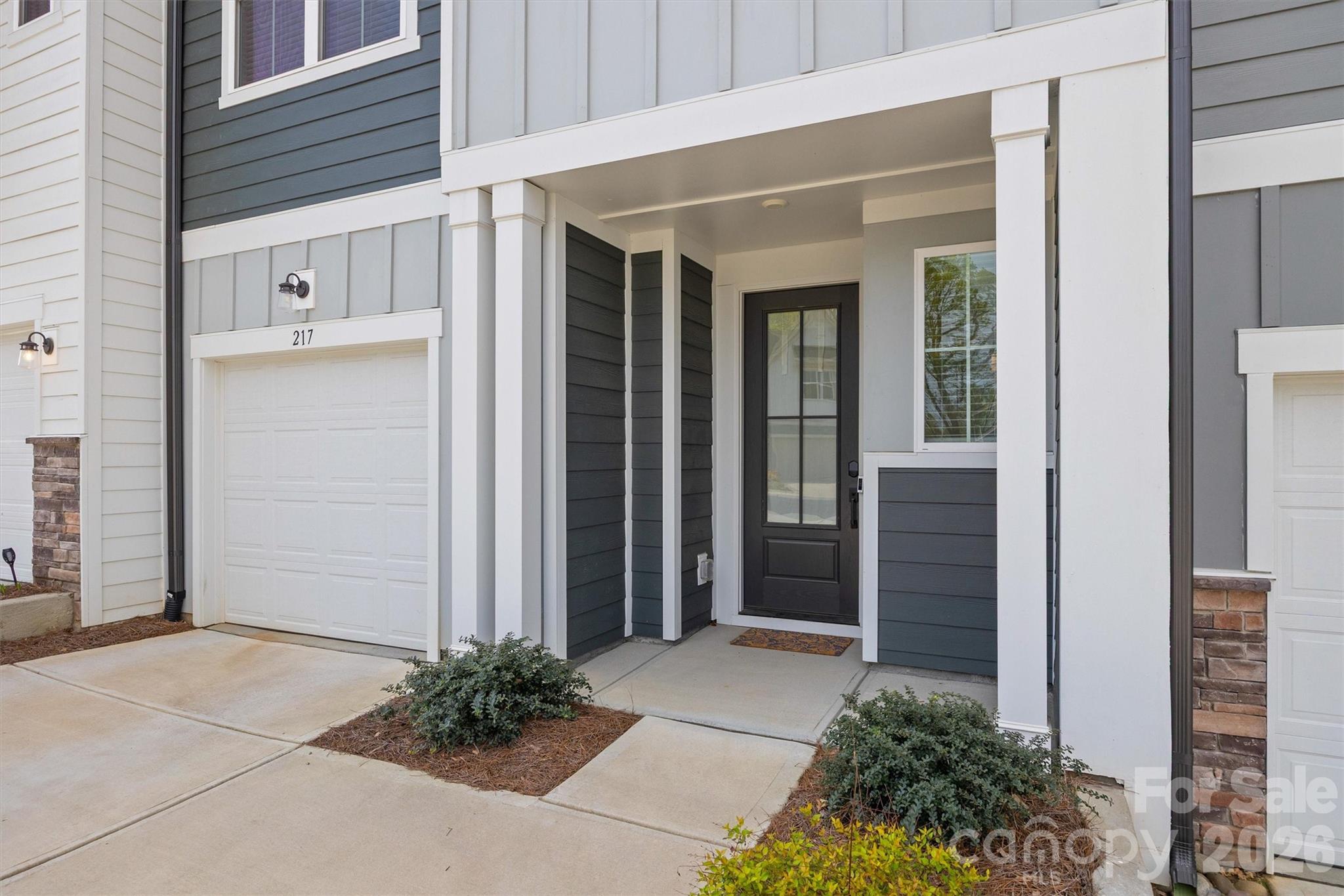 217 Brooks Springs Drive Fort Mill, SC 29708 - Photo 2 of 36 a entryway with a outdoor space