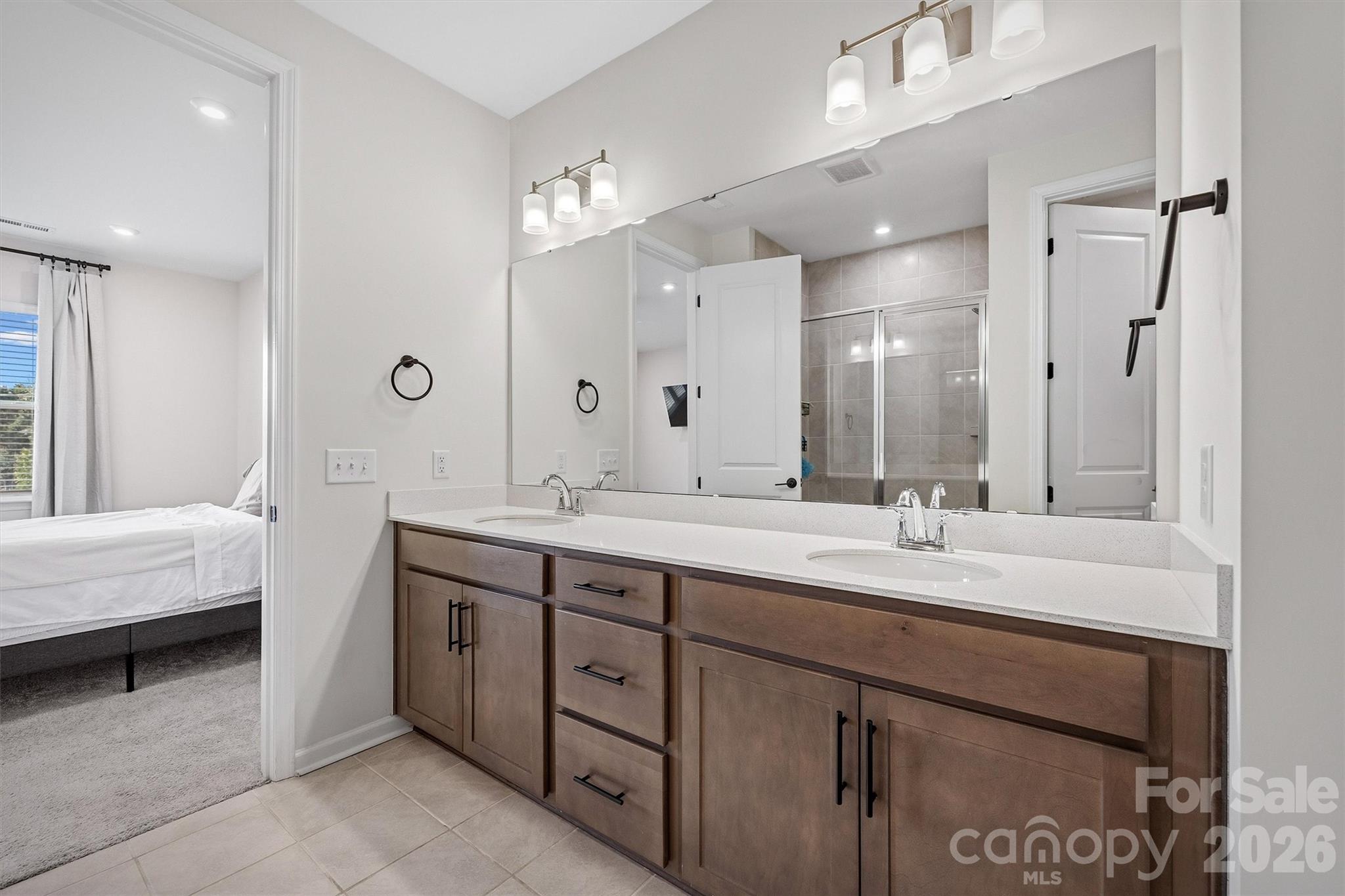 217 Brooks Springs Drive Fort Mill, SC 29708 - Photo 21 of 36 a spacious bathroom with a double vanity sink mirror and double