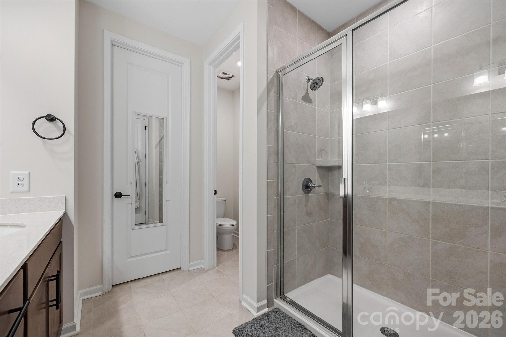 217 Brooks Springs Drive Fort Mill, SC 29708 - Photo 22 of 36 a bathroom with a shower and a sink