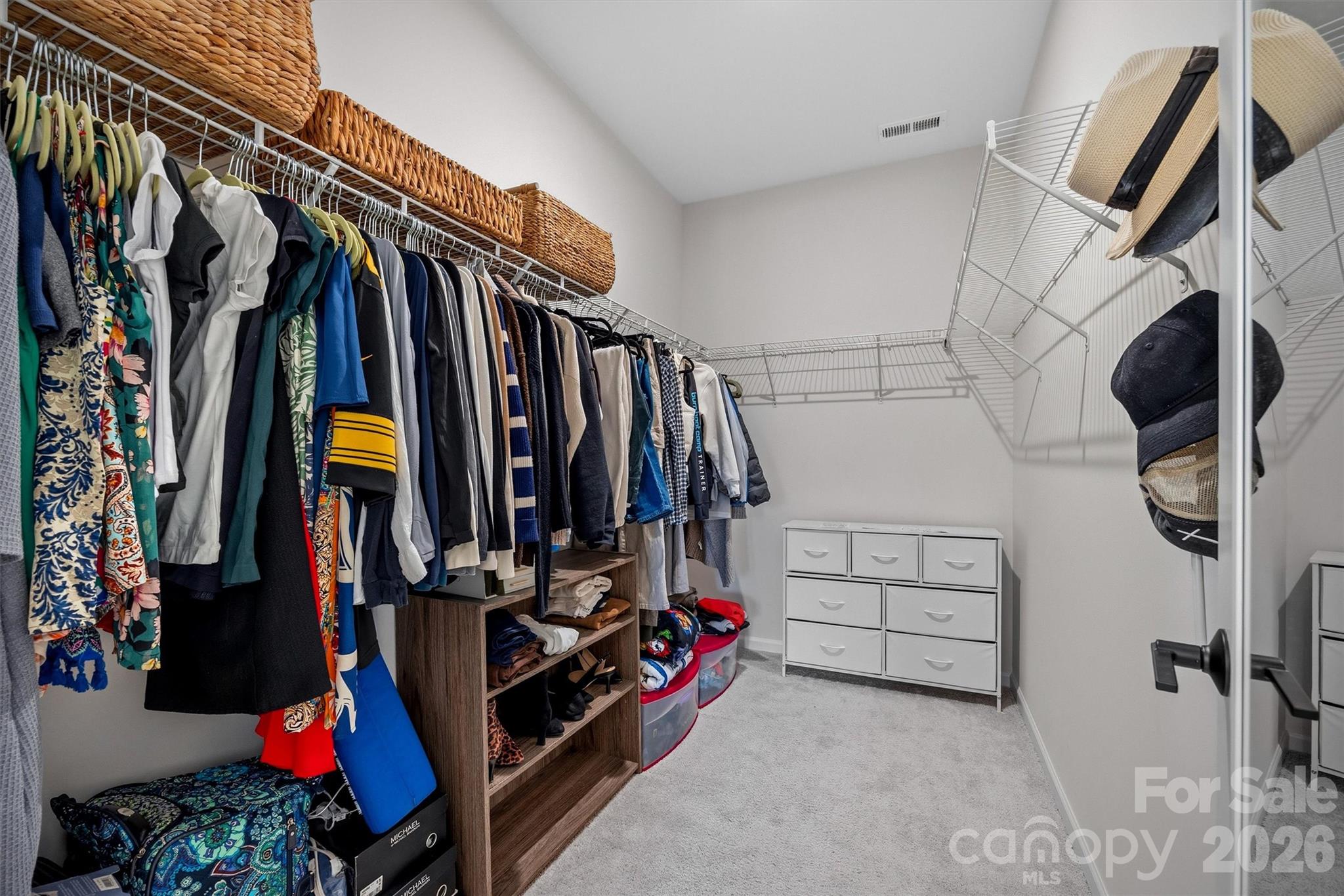 217 Brooks Springs Drive Fort Mill, SC 29708 - Photo 23 of 36 a view of walk in closet with clothes and shoes