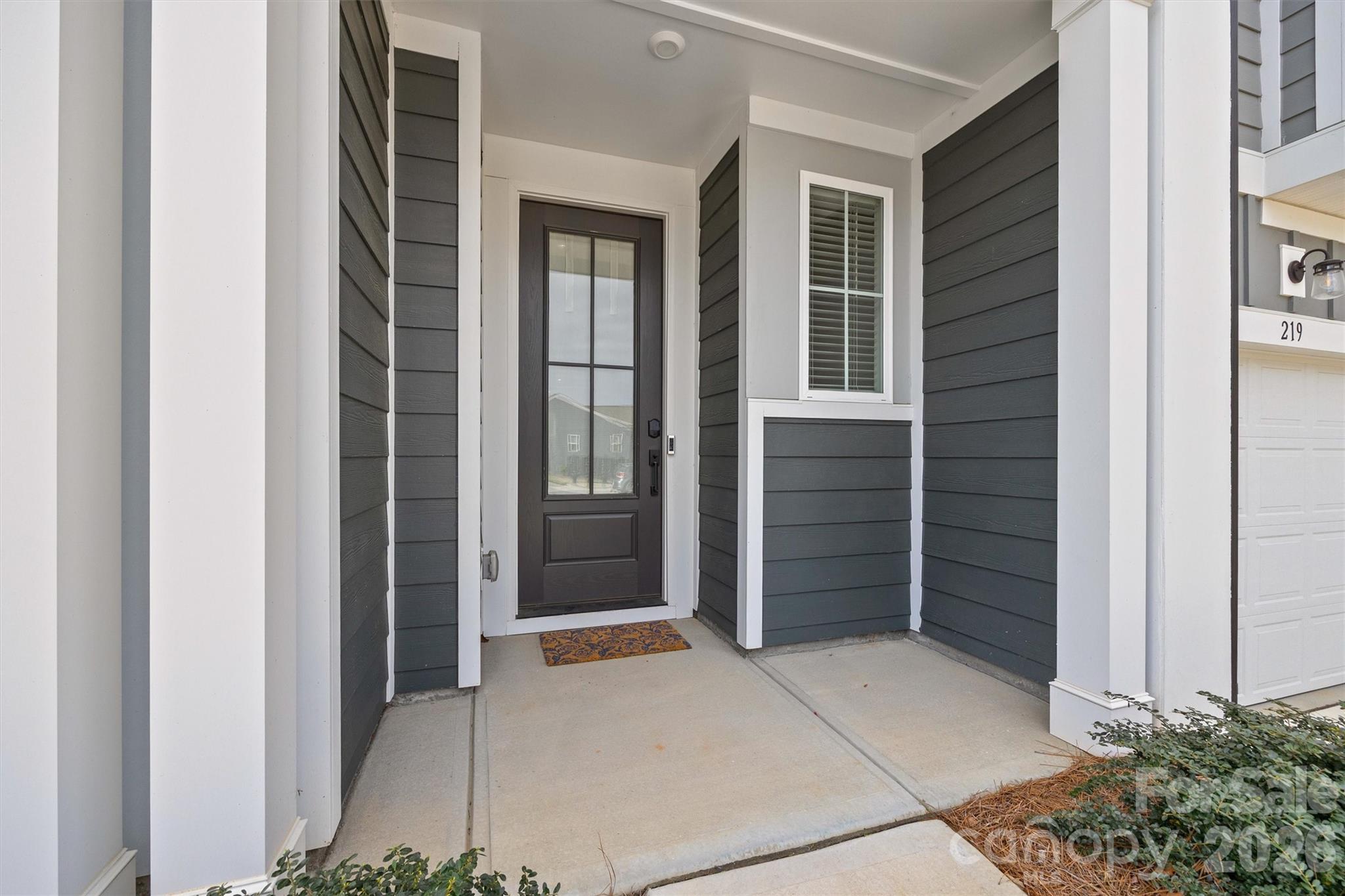 217 Brooks Springs Drive Fort Mill, SC 29708 - Photo 3 of 36 a view of house with hallway and wooden door
