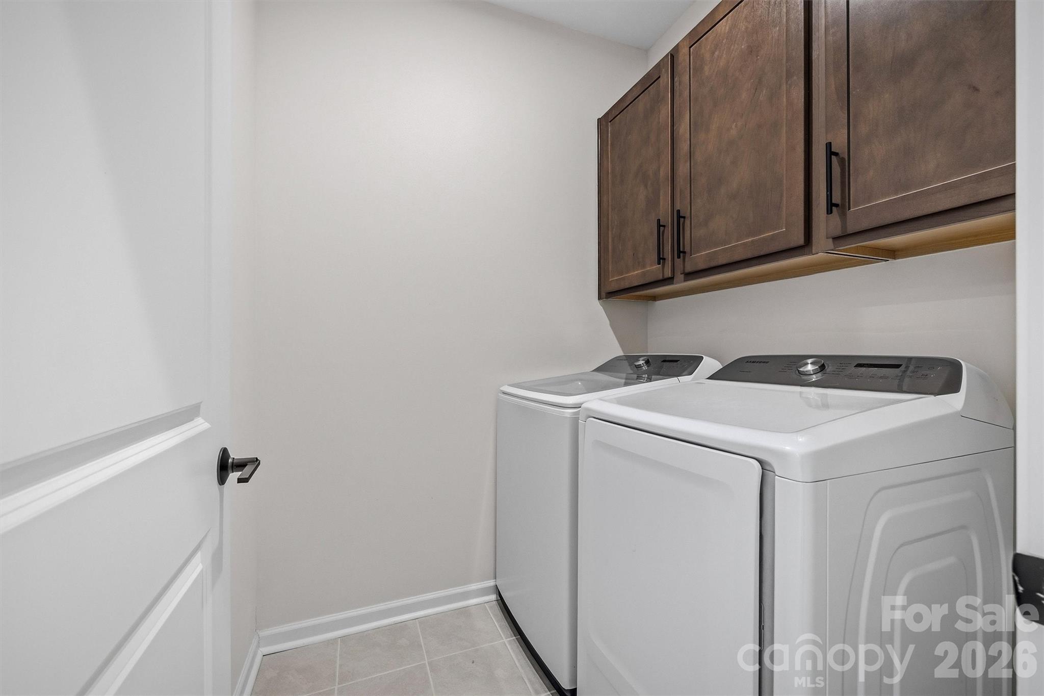 217 Brooks Springs Drive Fort Mill, SC 29708 - Photo 32 of 36 a utility room with dryer and washer