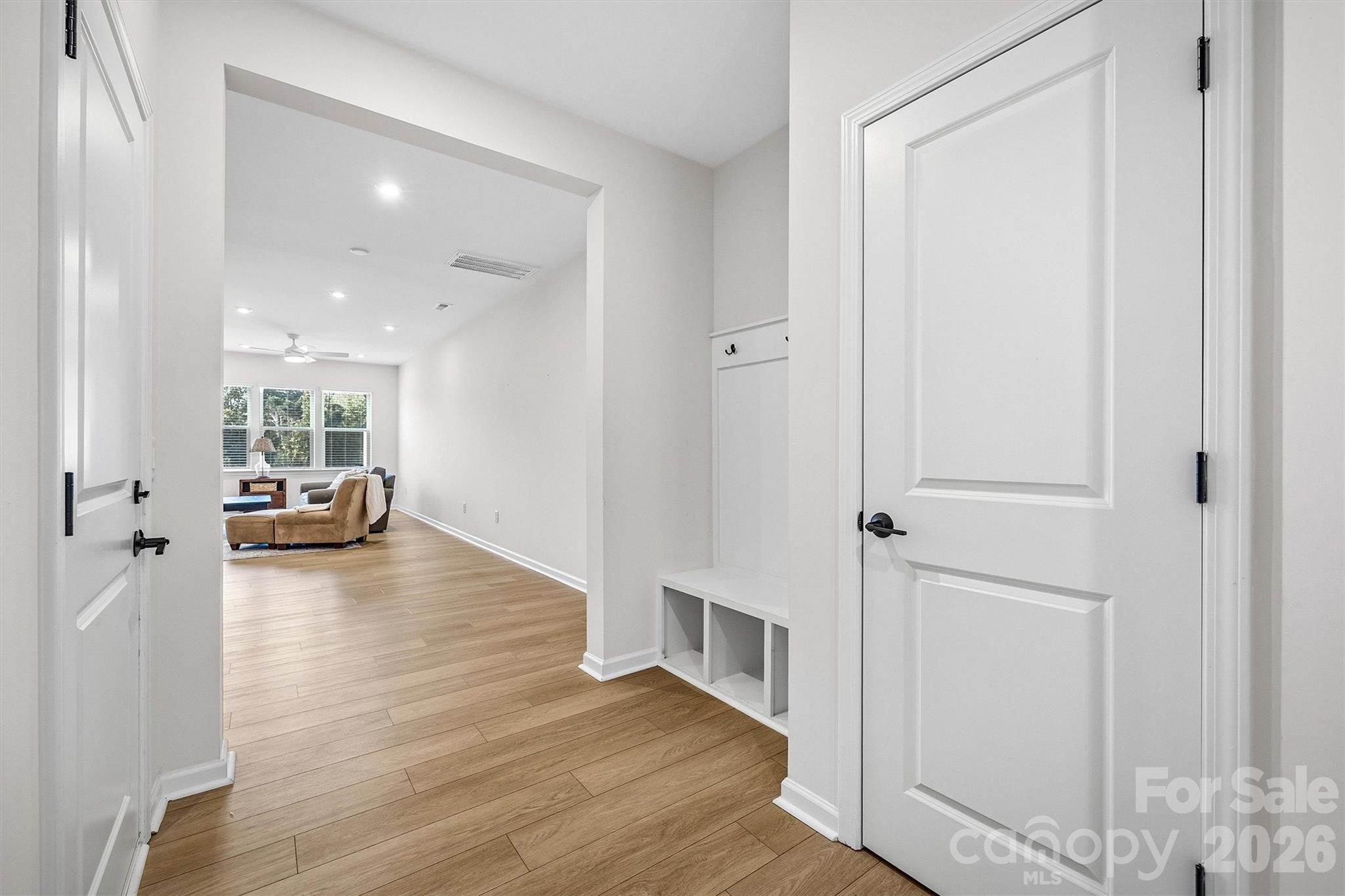 217 Brooks Springs Drive Fort Mill, SC 29708 - Photo 5 of 36 a living room with furniture and a wooden floor