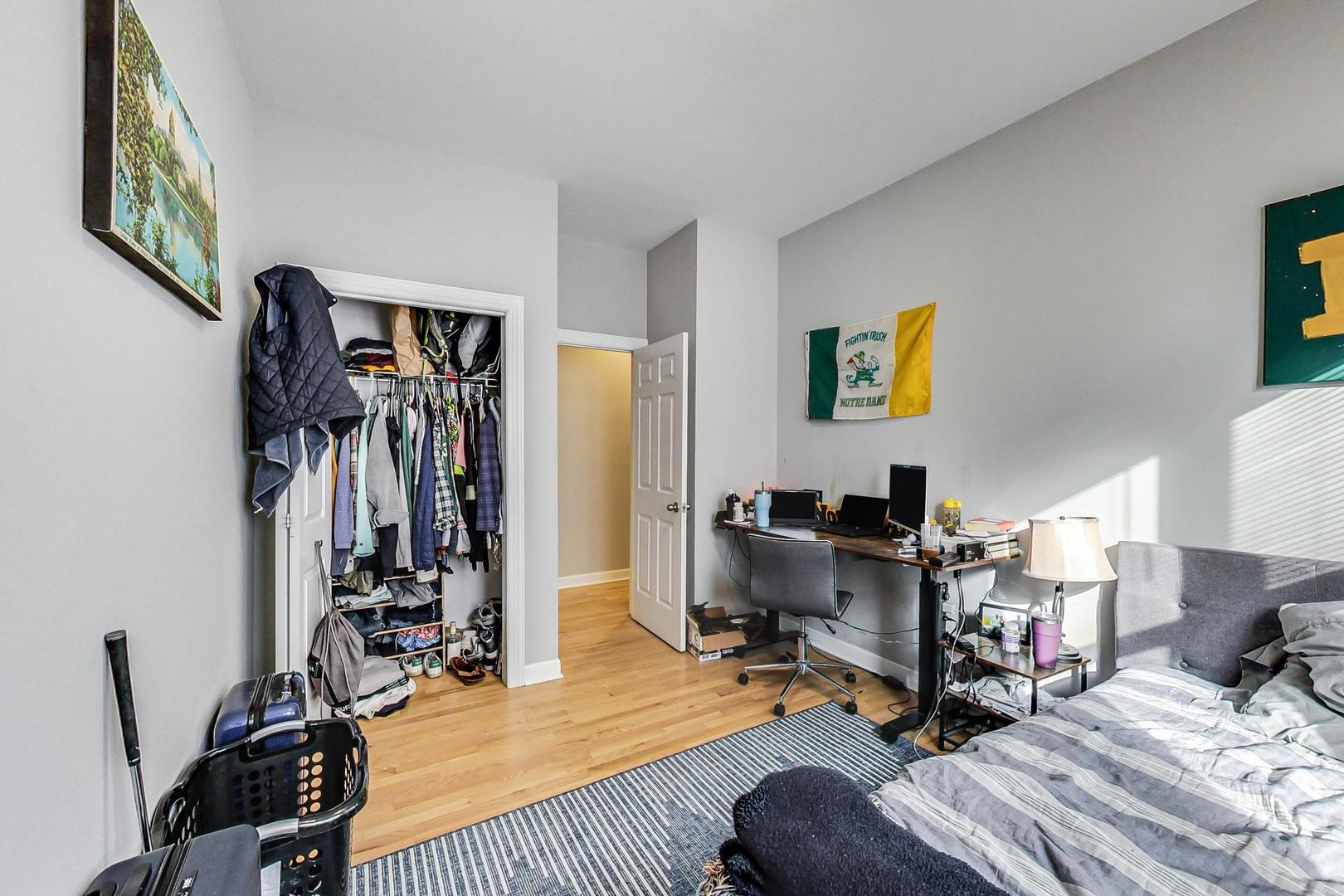 1330 West Fletcher Street, Unit 1 Chicago, IL 60657 - Photo 21 of 42 a view of a workspace with furniture and a bedroom