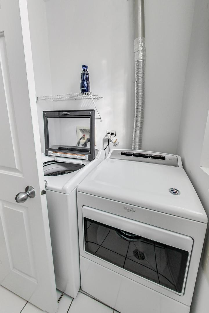 1330 West Fletcher Street, Unit 1 Chicago, IL 60657 - Photo 32 of 42 a utility room with dryer and washer