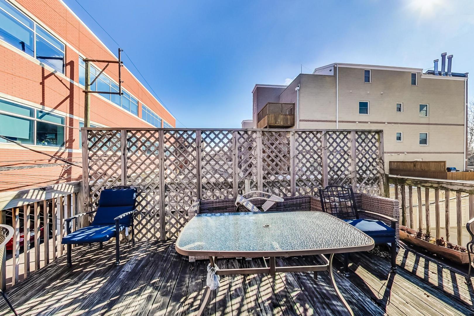 1330 West Fletcher Street, Unit 1 Chicago, IL 60657 - Photo 38 of 42 a view of a balcony with furniture