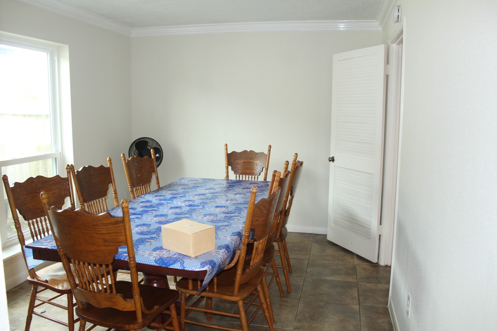11303 Windmark Drive Houston, TX 77099 - Photo 11 of 29 a view of a dining room with furniture and window