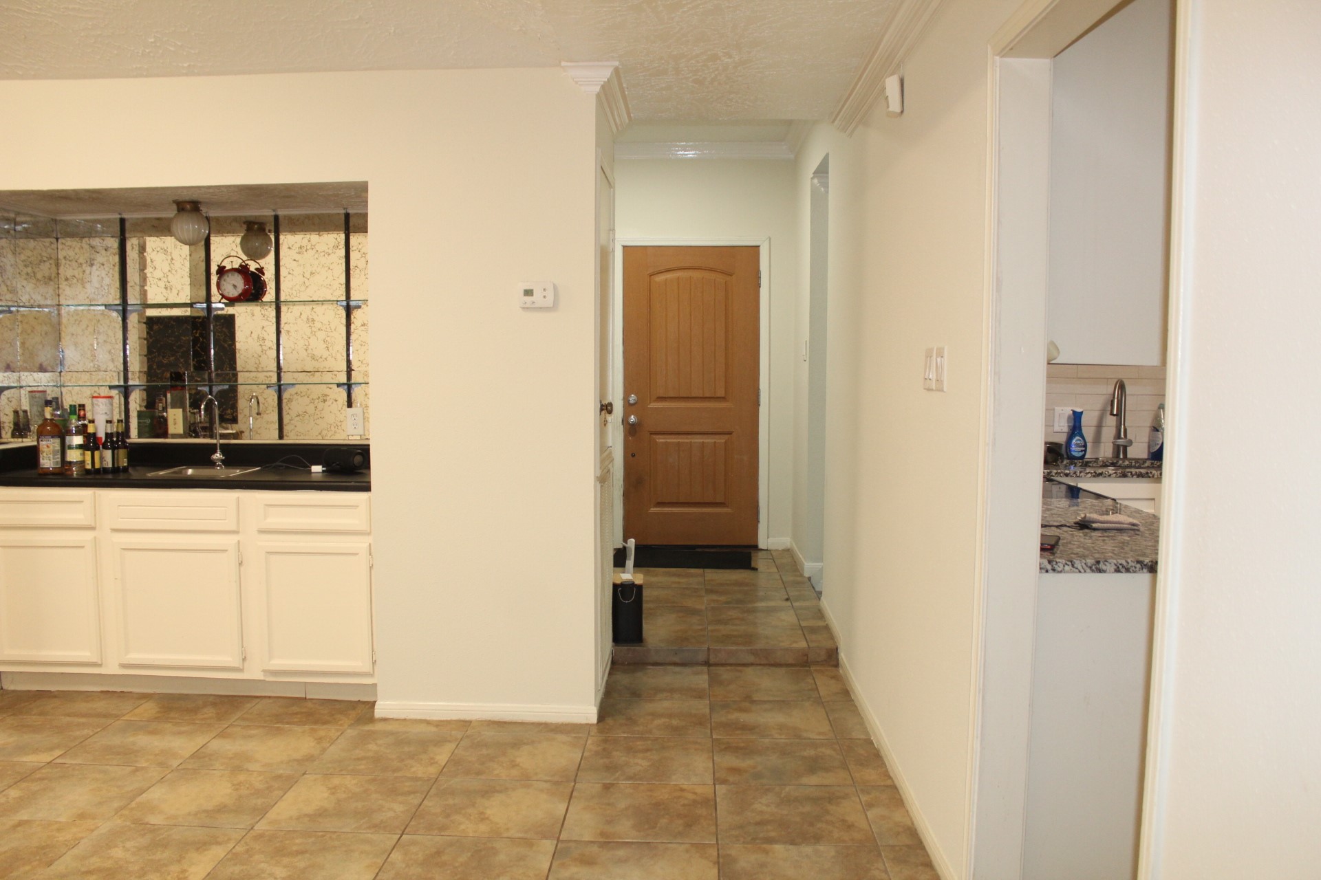 11303 Windmark Drive Houston, TX 77099 - Photo 16 of 29 a view of a hallway with wooden floor and closet