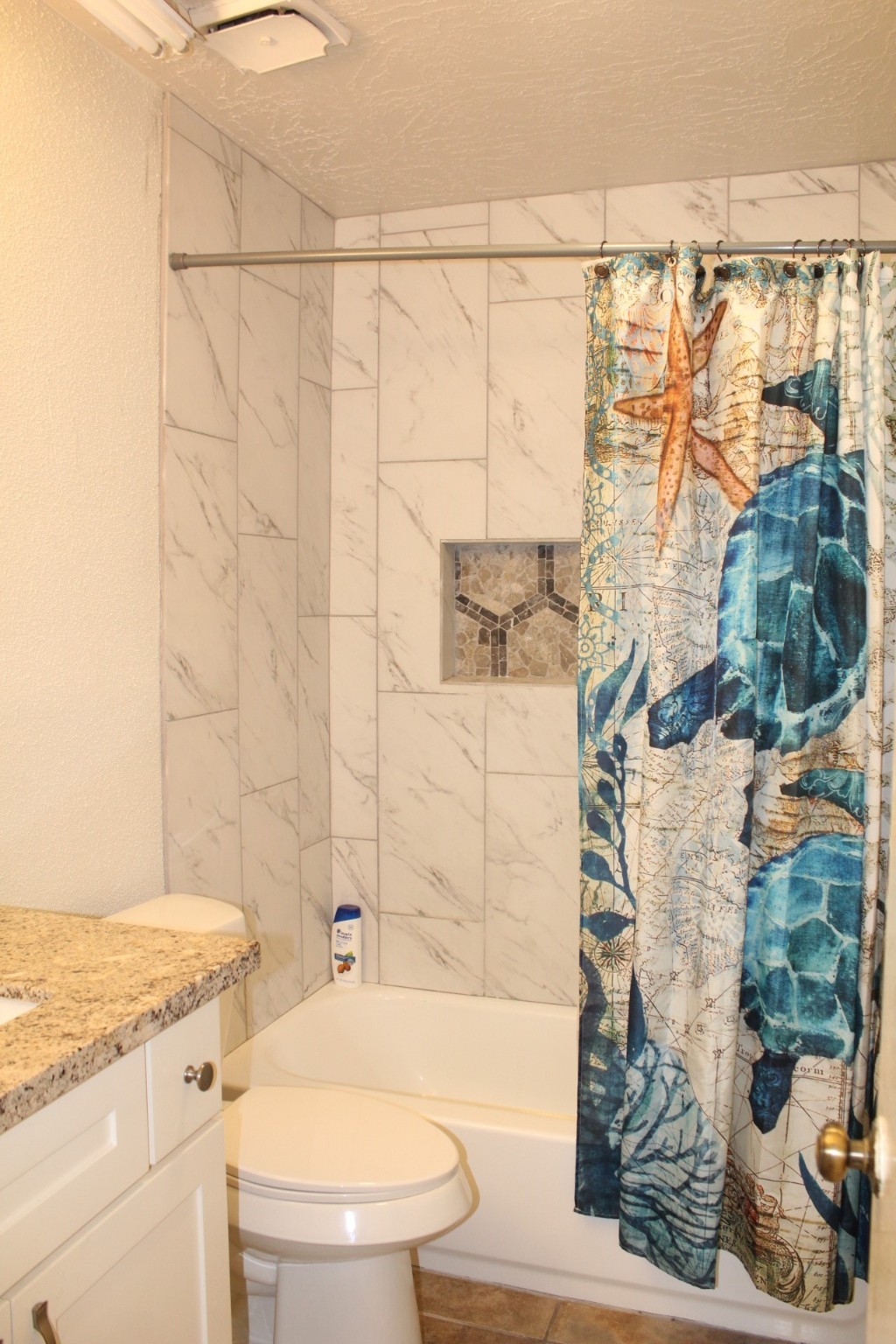 11303 Windmark Drive Houston, TX 77099 - Photo 19 of 29 a bathroom with a granite countertop bathtub shower sink and toilet