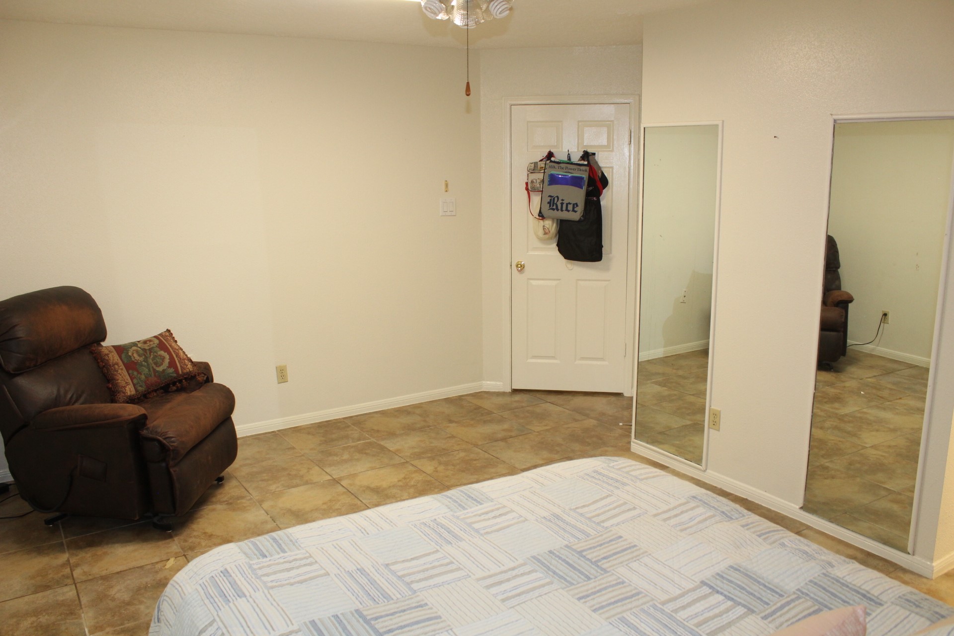 11303 Windmark Drive Houston, TX 77099 - Photo 25 of 29 a bedroom with a bed and furniture