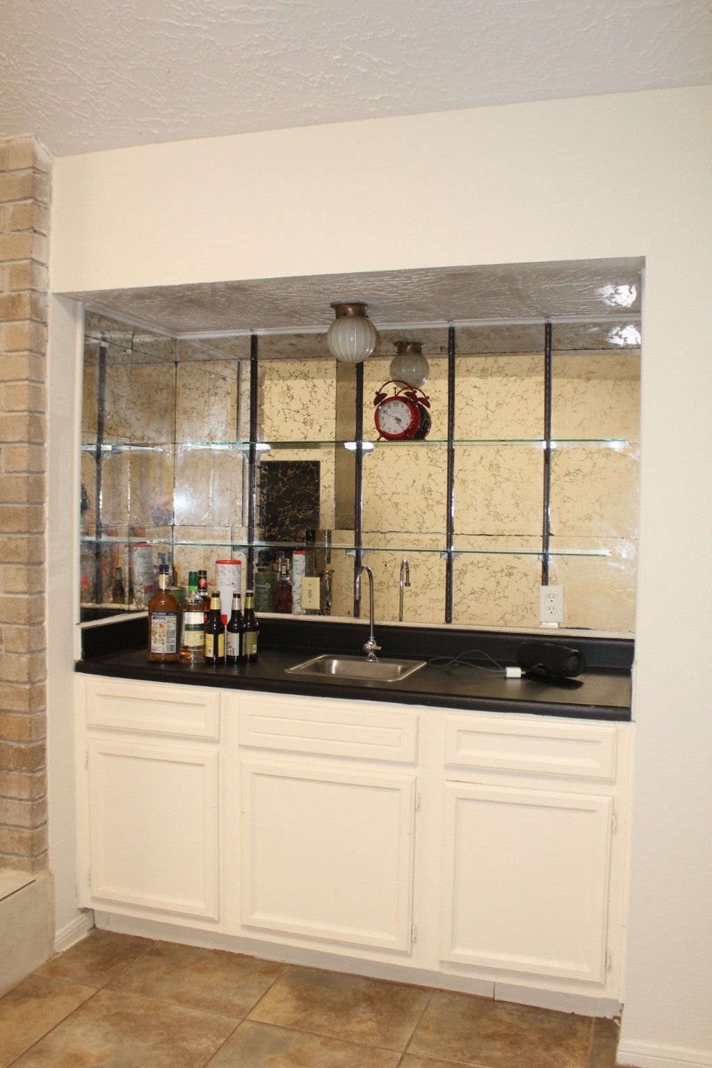 11303 Windmark Drive Houston, TX 77099 - Photo 29 of 29 a bathroom with a sink and a mirror