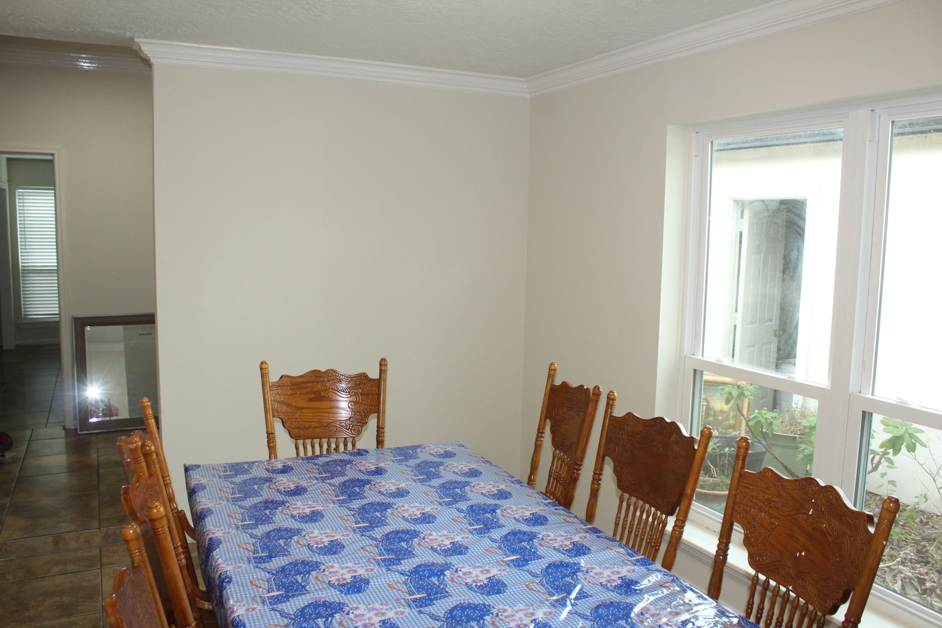 11303 Windmark Drive Houston, TX 77099 - Photo 10 of 29 a bedroom with a bed and wooden floor