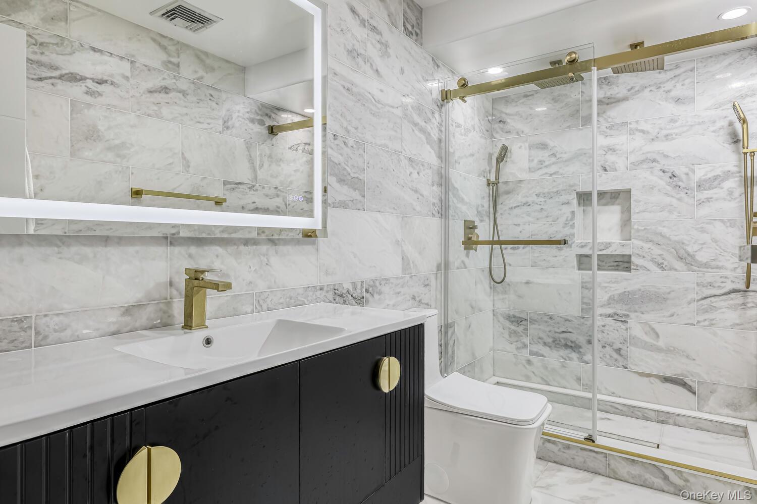 4 Cortland Road Monsey, NY 10952 - Photo 20 of 29 a bathroom with a sink a toilet and shower