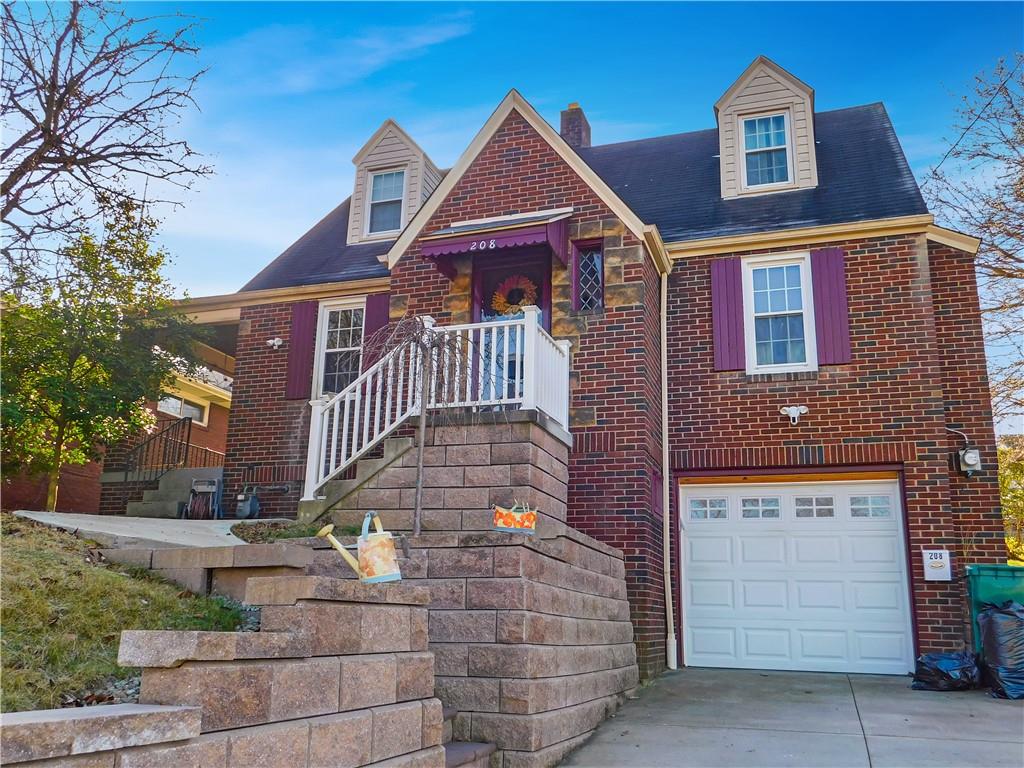 208 Springfield Avenue Washington, PA 15301 - Photo 1 of 19 a front view of a house with a yard