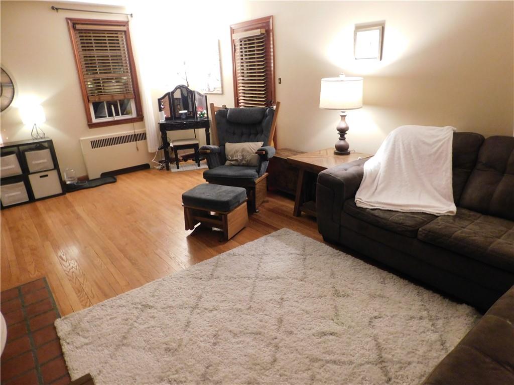 208 Springfield Avenue Washington, PA 15301 - Photo 11 of 19 a living room with furniture and a window