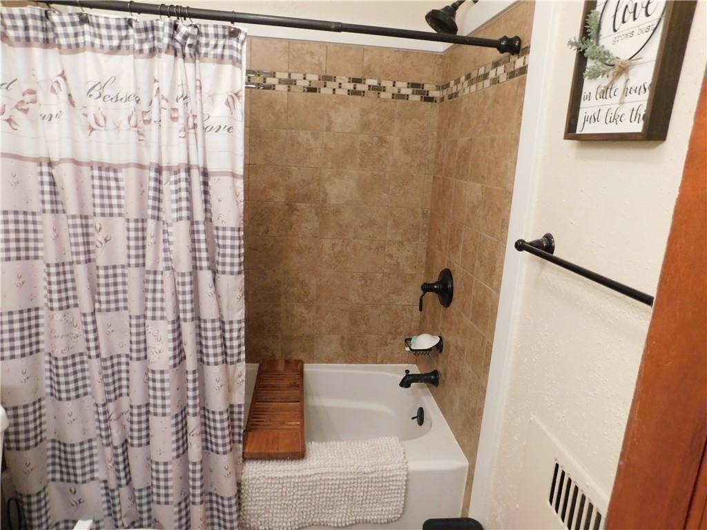 208 Springfield Avenue Washington, PA 15301 - Photo 16 of 19 a bathroom with a shower and a sink