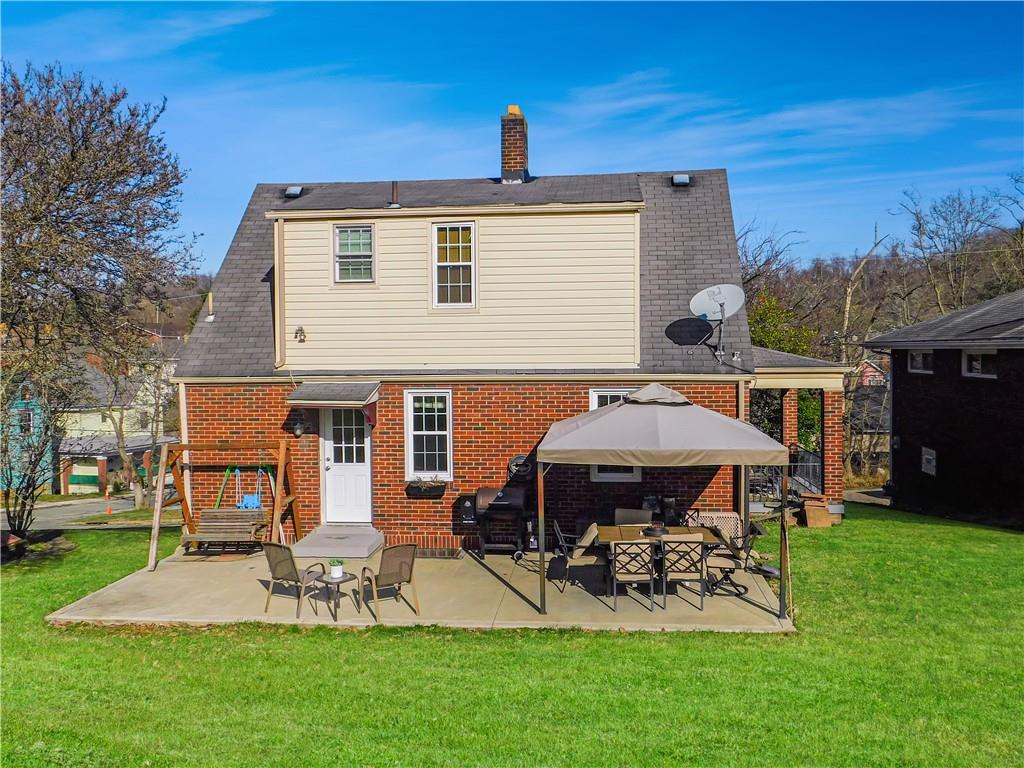 208 Springfield Avenue Washington, PA 15301 - Photo 3 of 19 a view of a house with a yard porch and sitting area