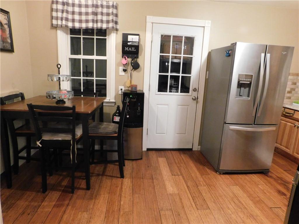 208 Springfield Avenue Washington, PA 15301 - Photo 6 of 19 a view of a dining room with furniture window and wooden floor