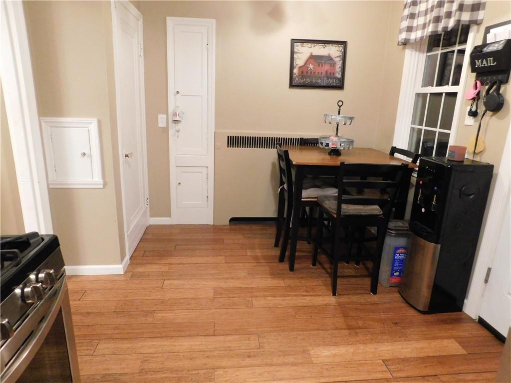 208 Springfield Avenue Washington, PA 15301 - Photo 7 of 19 a view of a workspace with furniture and wooden floor
