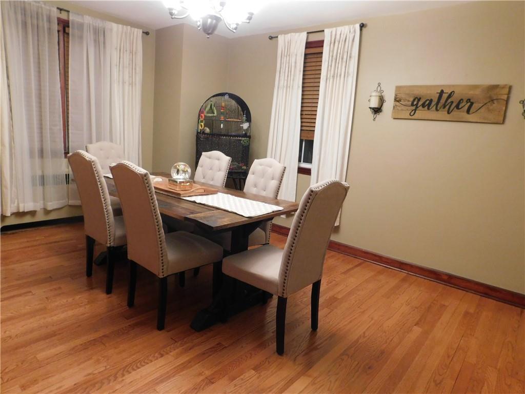208 Springfield Avenue Washington, PA 15301 - Photo 8 of 19 a view of a dining room with furniture and wooden floor