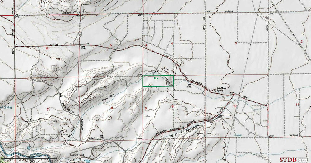 Lancaster Road West Lancaster, CA 93536 - Photo 4 of 6 a picture of white house with a tree