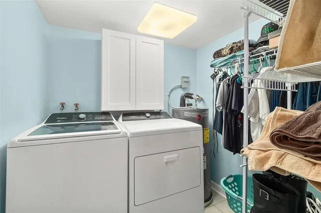 a backyard of a house with plants and outdoor seating