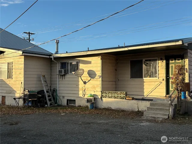 a front view of a house with a garage
