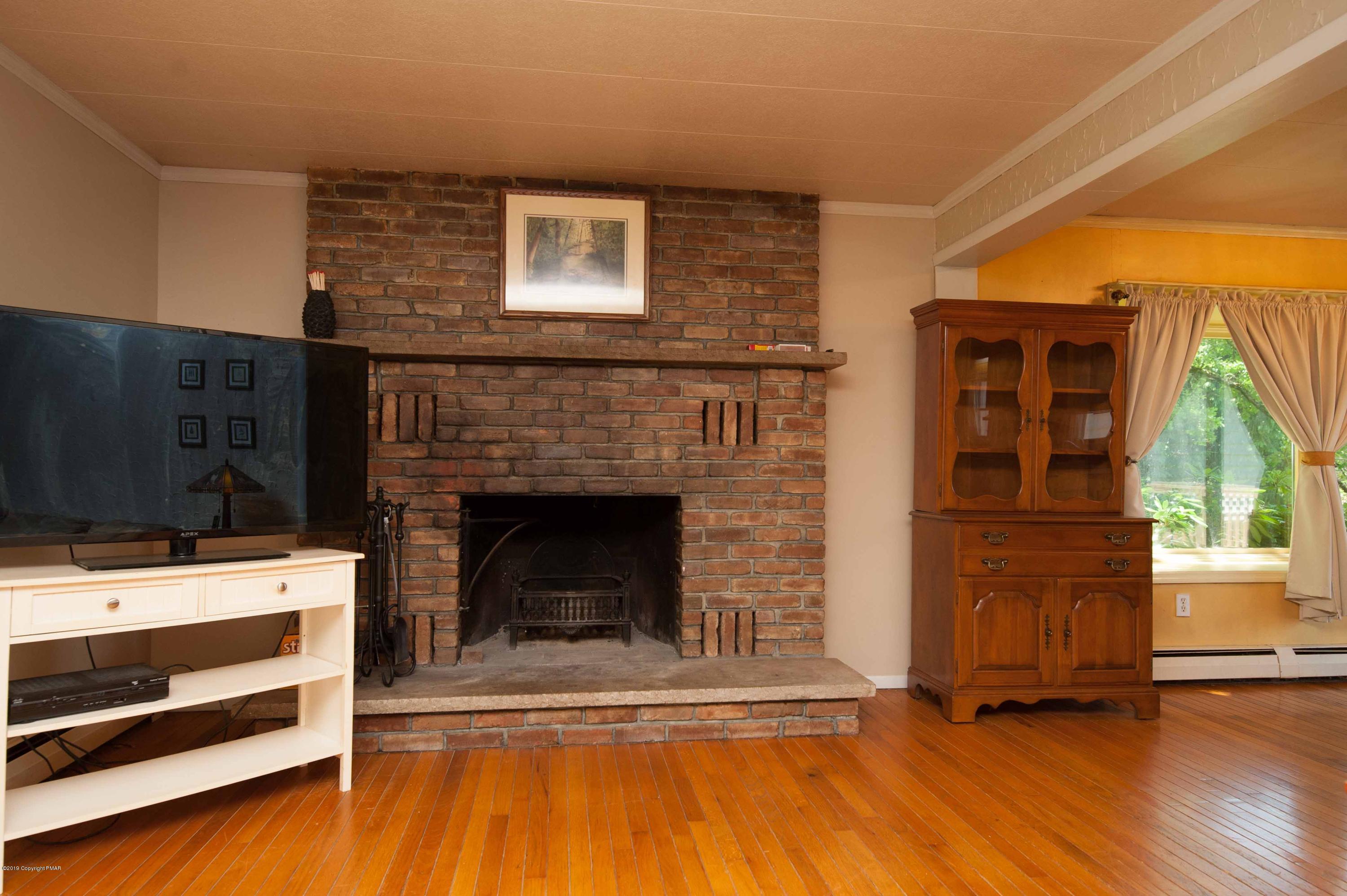 270 Gould Development Road Saylorsburg, PA 18353 - Photo 25 of 52 Living room fireplace