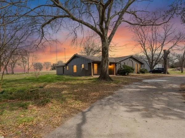 a front view of house with yard