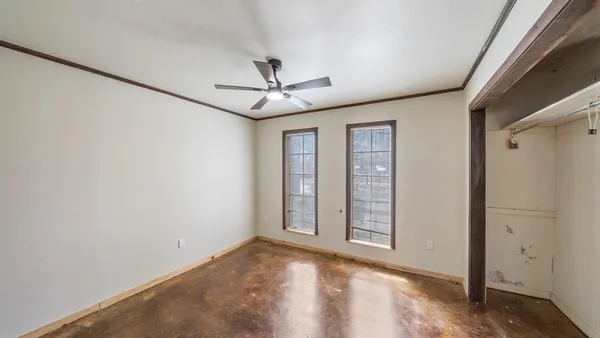 a bathroom with a sink a toilet a mirror and shower curtain