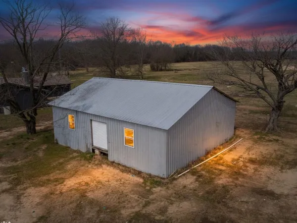 a view of empty room with wooden ceiling