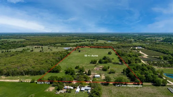 a view of a city with ocean view
